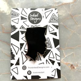 black man silhouette pin