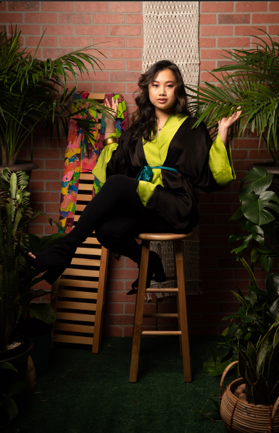 model on stool in a robe